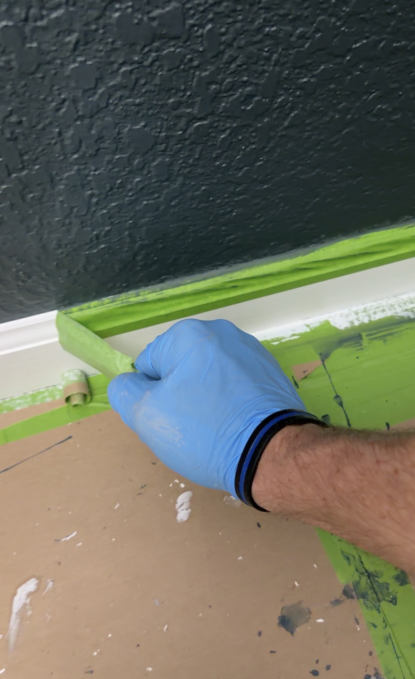 Trim painting tape removal and clean paint line by Hutch and Co.